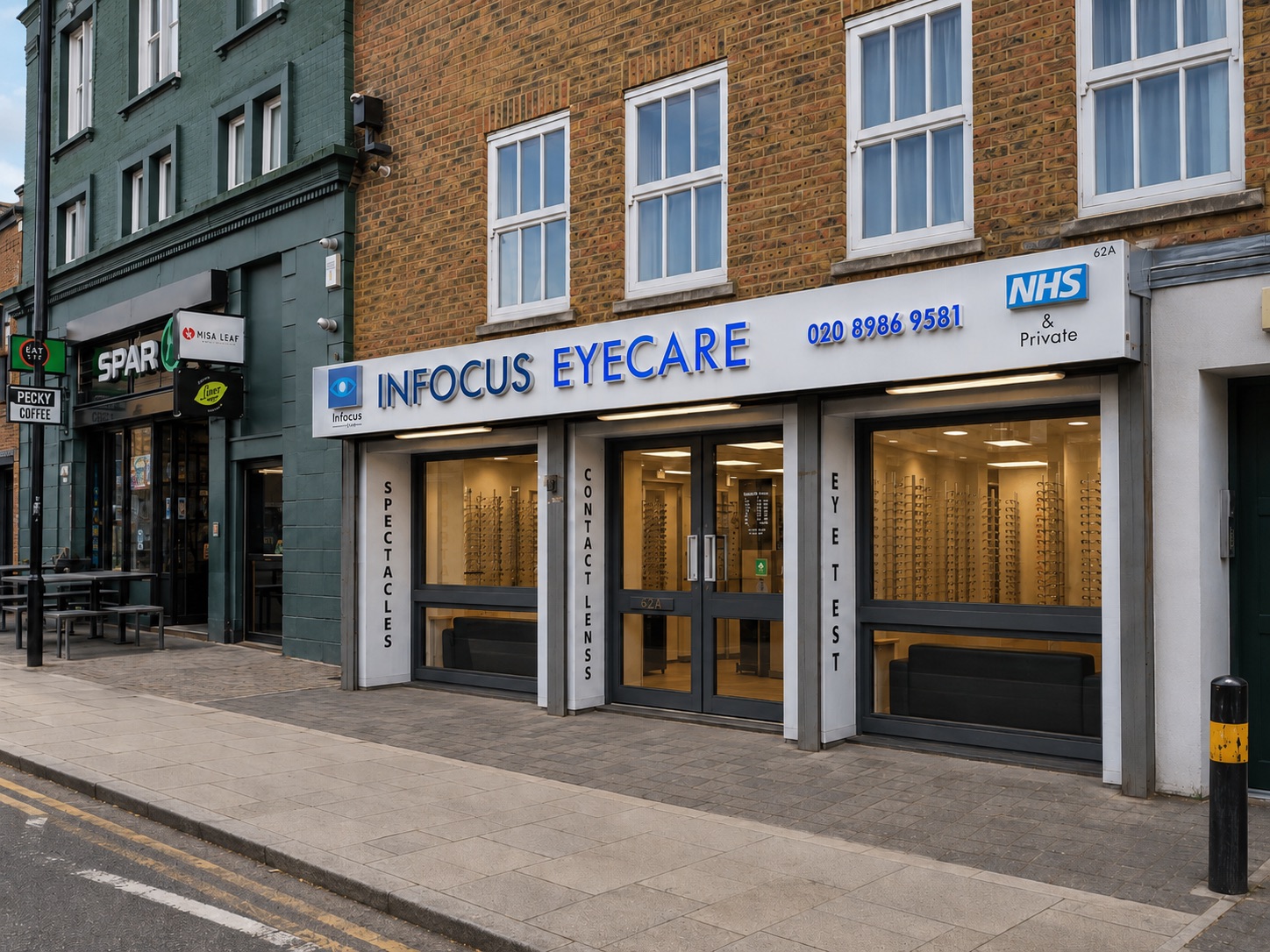 The Infocus Eyecare shopfront at 62a Brooksby's Walk, Homerton, next to a Spar